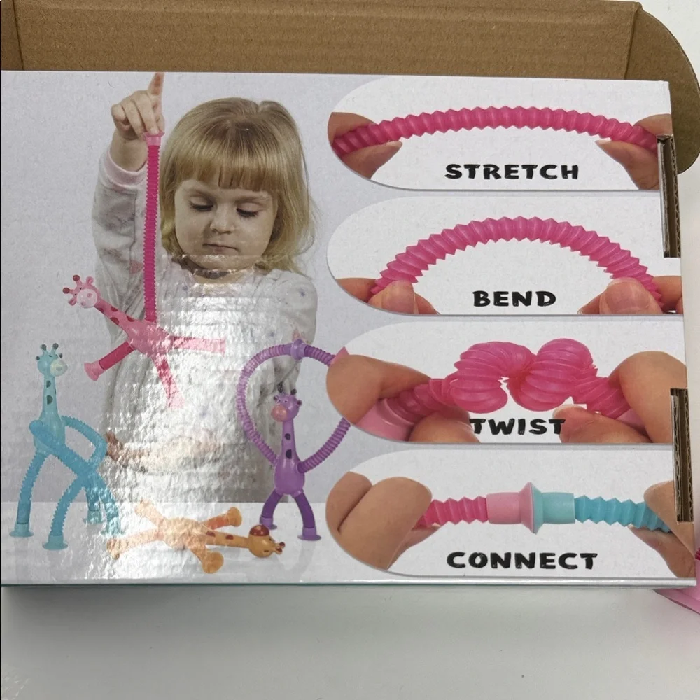 2 Colorful Suction Cup Giraffe Stretch Toys for Kids Pink and Orange NEW No tag